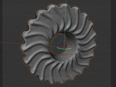 The cookie's subdivided mesh in the Cinema 4D viewport, at 3:14 of the lesson